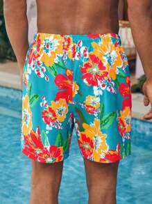 Manfinity VDAYZ 1 pieza Pantalón corto de playa con estampado floral gráfico para hombres, traje de baño a juego para parejas, para la playa, vacaciones, hawaiano