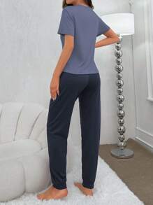 Conjunto de pijama de mangas cortas y pantalones largos impresos con pestañas y letras para primavera y verano