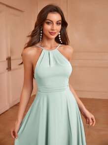 Aureia Adult Bridesmaid Dress With Halter Neck, Low Back, Cinched Waist, Flowy A-Line Dress With Asymmetrical Ruffle Hem On The Back Elegant Dress - Green - View 4