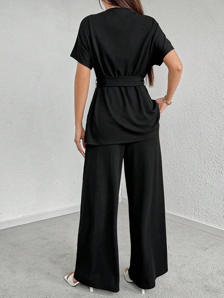 Women's Round Neck Letter Print Short Sleeve Top And Pocket Detail Solid Colored Pants Set