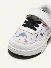 Cozy Pixies Boys' Casual, Fashionable, & Cute Dinosaur Printed Canvas Shoes With Cartoon Style, Anti-Collision Toe Design, Adjustable Hook And Loop And Waterproof Properties