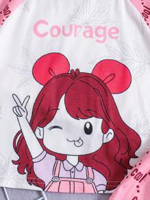SHEIN Conjunto de pijama cómodo informal y lindo para niña joven con patrón de dibujos animados en la parte superior de manga raglán corta y shorts