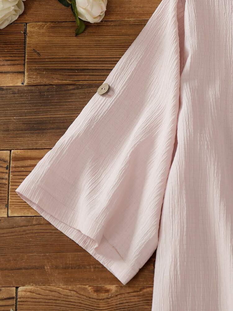 Plus Size Solid Color Round Neck Casual Shirt With Textured Fabric