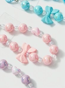 SHEIN Correa para teléfono móvil brillante y colorida con decoración de lazo aleatoria y cuentas - Multicolor - Ver 4