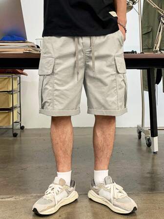 Manfinity Hypemode شورت رجالي فضفاض مع جيوب بغطاء وخصر بسحاب