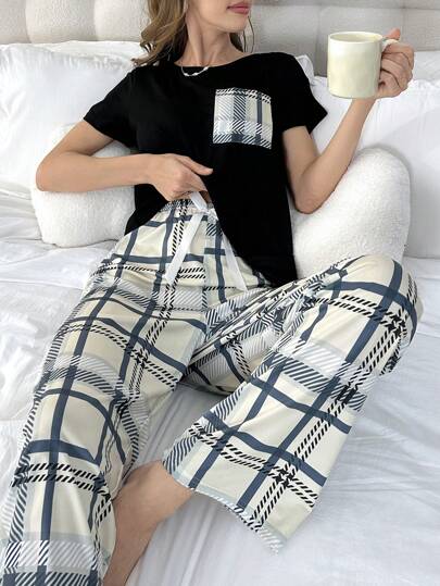 Conjunto de pijama de mujeres de moda con pantalones largos y mangas cortas a cuadros