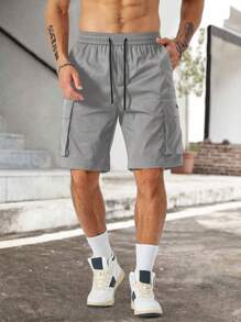 Manfinity Homme Shorts de carga para hombres con cintura ajustable y cordón, bolsillos amplios con solapa y diseño gráfico de eslogan