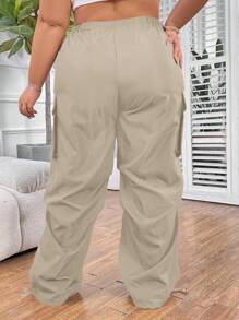 SHEIN CURVE+ Plus Size Women Solid Color Elastic Waist Cargo Pocketed Casual Loose Fit Long Pants
