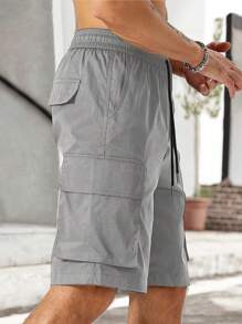 Manfinity Homme Shorts de carga para hombres con cintura ajustable y cordón, bolsillos amplios con solapa y diseño gráfico de eslogan