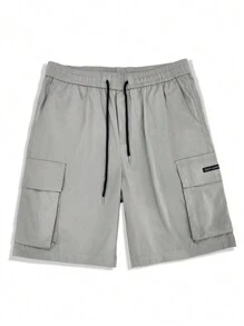 Manfinity Homme Shorts de carga para hombres con cintura ajustable y cordón, bolsillos amplios con solapa y diseño gráfico de eslogan