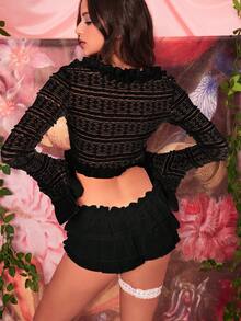 Shorts mini a vita bassa con orlo a balze e pizzo - nero - Visualizzare 2