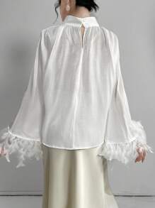 Modelyn Women's Furry Splice Flare Sleeve Shirt