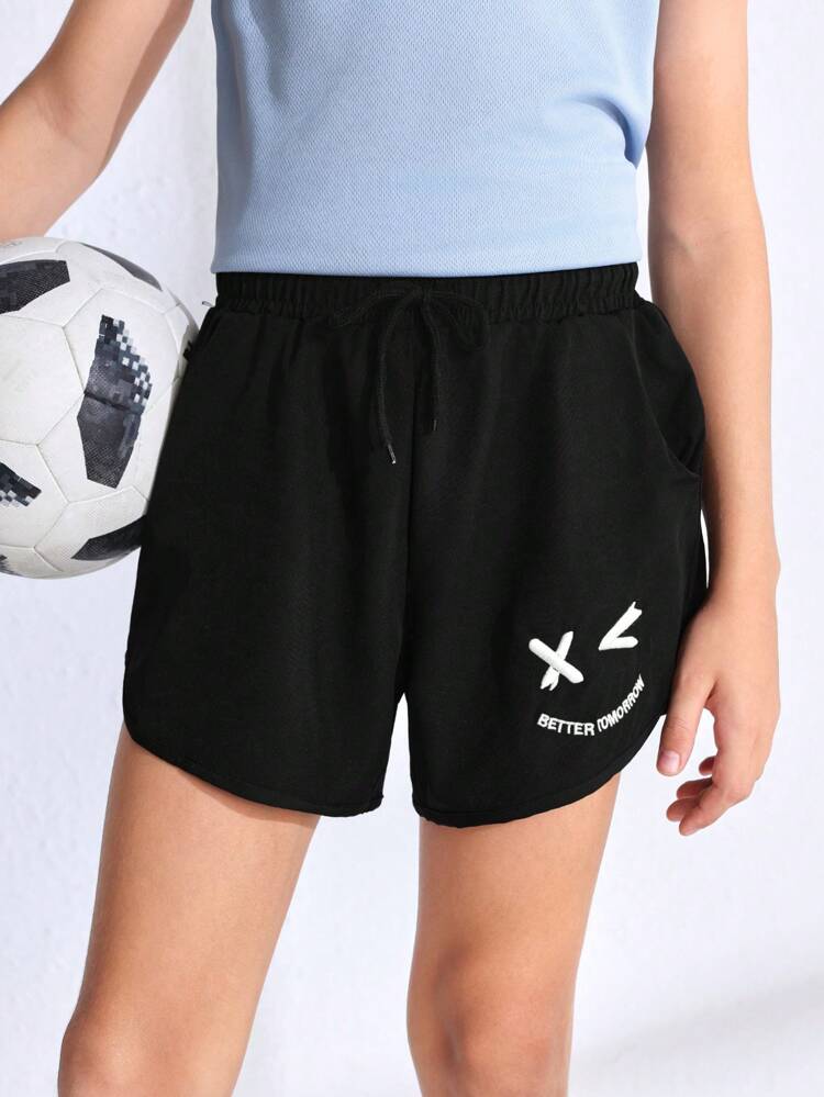 Tween Boy Cartoon Expression & Letter Print Sport Shorts With Pockets