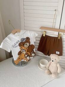SHEIN Bé Trai Bé Gái Hoạt Hình Họa Tiết Gấu Có Mũ Trùm Đầu Áo Nỉ Tay Ngắn Có Huy Hiệu Trang Trí & Quần Short Thường Ngày 2 Cái/bộ - Cà phê nâu - Xem 5