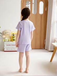 SHEIN Conjunto de camiseta con cuello redondo y manga corta + shorts púrpuras de rejilla de miel para niñas jóvenes con estilo minimalista, ropa cómoda y holgada para estar en casa