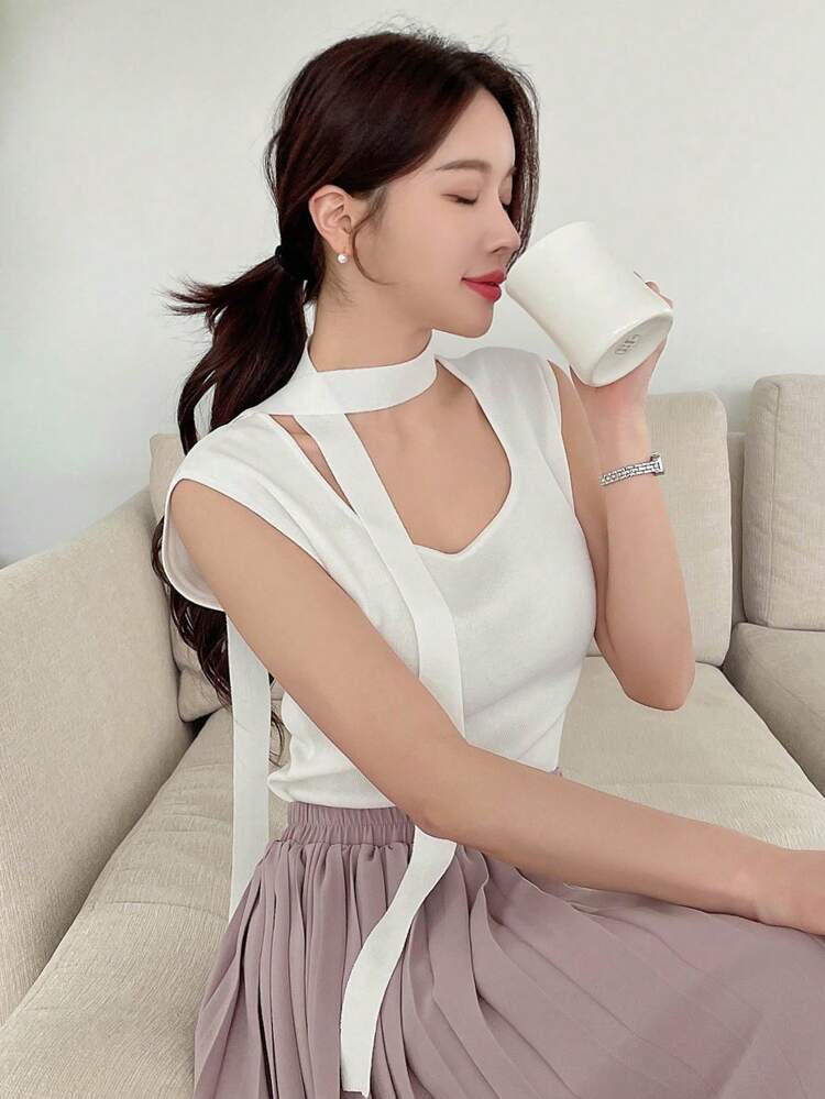 Women Round Neck Solid Color Ribbed Hole Knit Top