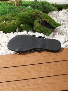 Fashionable Women Black Flat Studded T-Strap Thong Roman Sandals