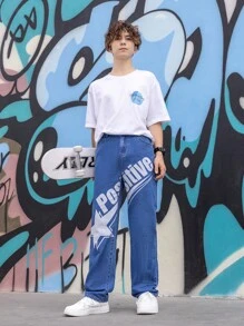 Jeans casuales y frescos para adolescentes, de tiro bajo, corte cónico y grandes, lavado azul medio con eslogan de estilo callejero y estampado de estrellas