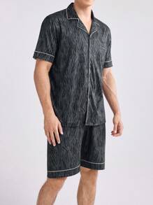 Conjunto de ropa de hogar para hombre con camiseta estampada completa con ribete de contraste y pantalon corto
