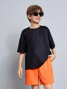 Conjunto de dos piezas para niño preadolescente con camiseta de manga corta y shorts con gráficos de letras grandes