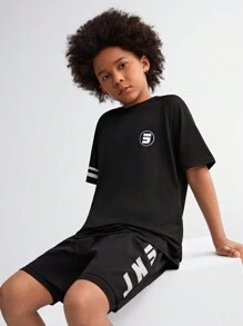 SHEIN Tween Boy Anti-Light Transit Base Layer Shorts With Letter Print Design, Diagonal Side Pockets And Drawstring Waist