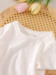 SHEIN LMoss Kids 年轻女孩针织纯色圆领休闲 T 恤搭配编织碎花印花细肩带连衣裙套装