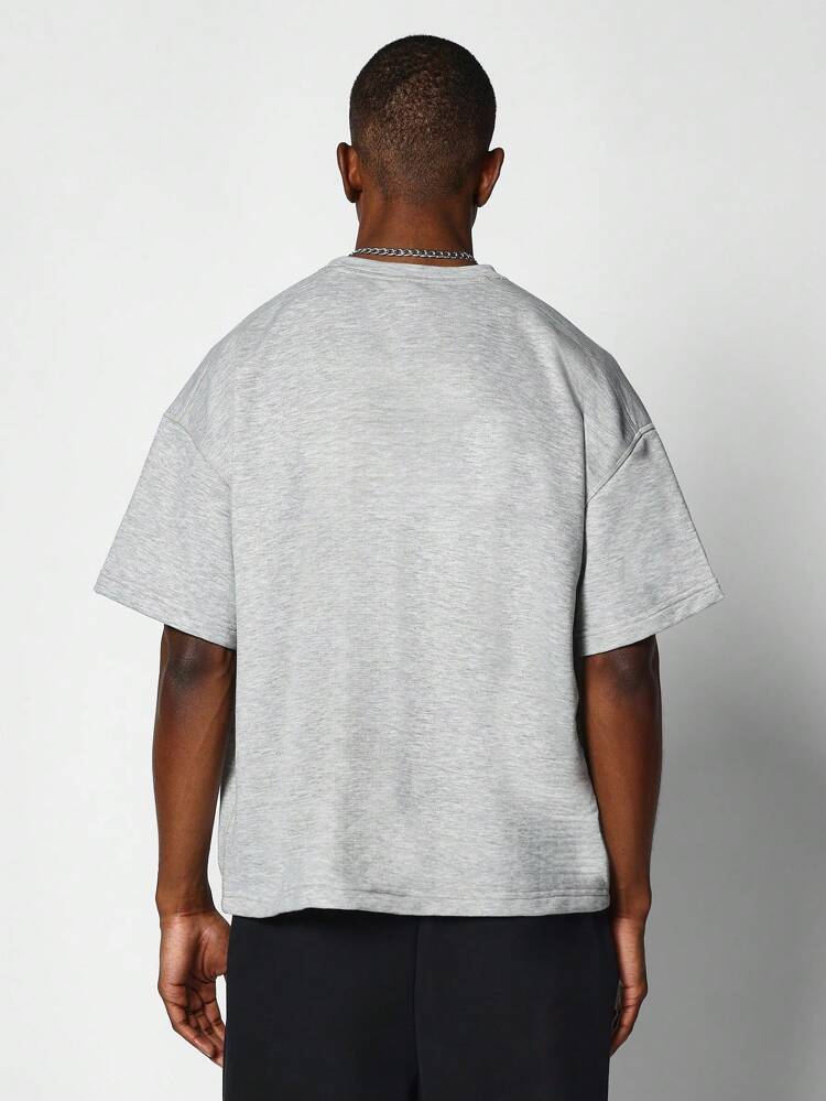 T-shirt essenziale oversize a manica corta in tessuto pesante