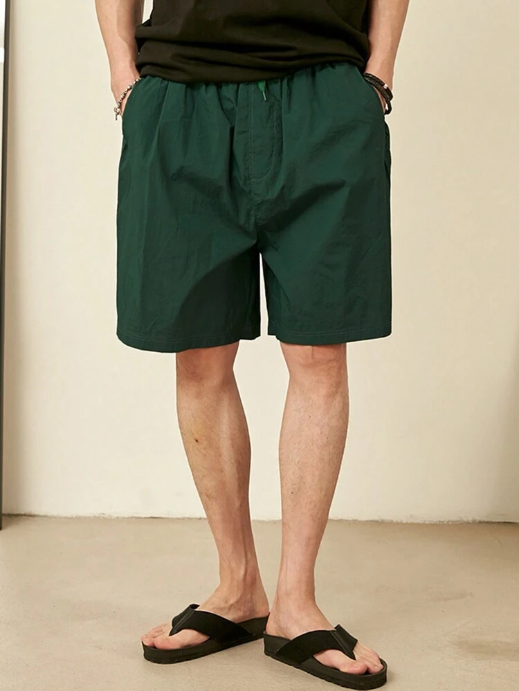 Men Summer Solid Color Drawstring Shorts With Pockets
