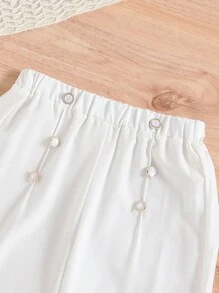 SHEIN Conjunto de outfit para niña preadolescente con top de cuello redondo con volantes y pantalones anchos de pierna ancha con botones en la parte delantera - Azul y blanco - Ver 5