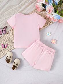 Conjunto de camiseta de manga corta con cuello redondo con aplicaciones florales y shorts para bebé niña - Rosa - Ver 2