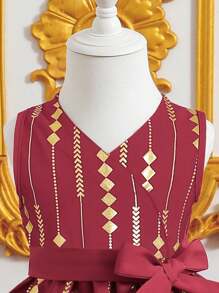 Vestito da festa con scollo a V e stampa in foglia d\"oro per bimba