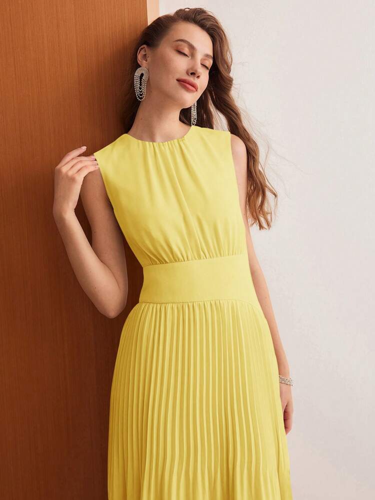SOLID ZIPPER BACK PLEATED HEM DRESS