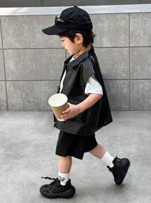 SHEIN 3pcs/Set Young Boy Street Style Sleeveless Zipper Leather Pocket Vest, Patch Label Shorts, And Solid Round Neck T-Shirt, Casual Comfortable Outfit Suitable For Spring And Summer Outdoor Scenes And Styling