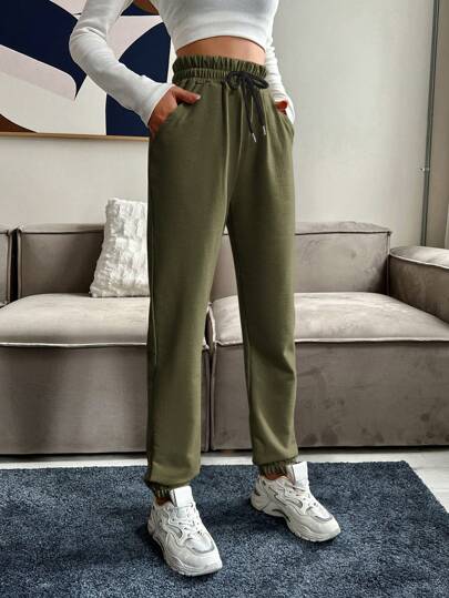 RueChic 腰部抽繩斜口袋衛褲