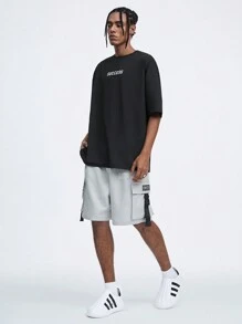 Manfinity RebelGame Shorts da lavoro casual con logo stampato e cintura con coulisse per la primavera/estate per uomo