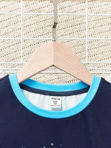 SHEIN Conjunto de pijama cómodo tejido de punto para niño preadolescente con estampado de dinosaurio, ajuste ceñido, mangas cortas y pantalones largos - Azul Marino - Ver 5