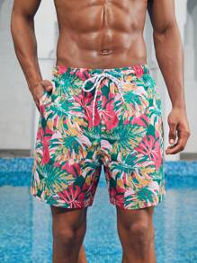 Manfinity 1 pieza Pantalón corto de verano de hombre con estampado de hojas sueltas, traje de baño a juego para parejas, vacaciones estilo hawaiano