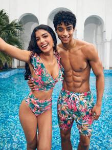 Manfinity 1 pieza Pantalón corto de verano de hombre con estampado de hojas sueltas, traje de baño a juego para parejas, vacaciones estilo hawaiano