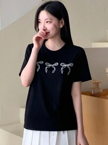 DAZY Women Loose-Fit Round Neck T-Shirt With Bow Detail Print And Bow Decoration Cute Tops