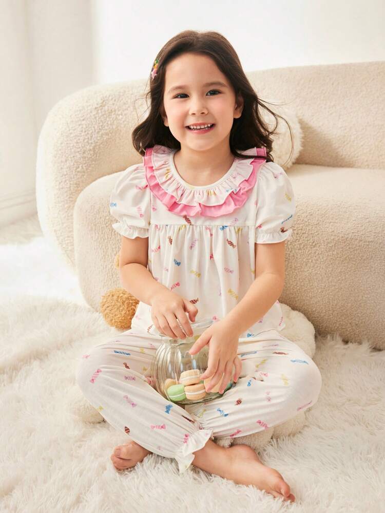 Young Girl Princess-Style Sweet And Lovely Knitted Pajama Set, Featuring Bubble Sleeves, Ruffle Trim And Candy Printed Patterns.