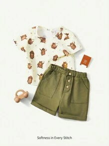 Cozy Pixies Conjunto de 2 piezas para bebé niño con parte superior de manga corta cuello redondo con estampado de oso de dibujos animados y shorts deportivos informales