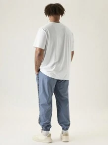 Manfinity VCAY 2Pcs Men Plus Size Summer Casual Outfit, Including Smile Face Print Round Neck Short Sleeve T-Shirt And Side Stripe Drawstring Waist Jogger Pants , Going Out , Color Block