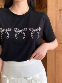 DAZY Women Loose-Fit Round Neck T-Shirt With Bow Detail Print And Bow Decoration Cute Tops