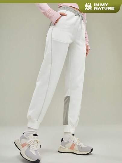 In My Nature 女款綁繩腰彩色拼接戶外運動長褲，斜口袋和彈性袖口