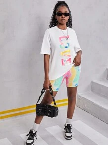 SHEIN Maglietta oversize per ragazza in tinta unita bianca e rosa con effetto tie-dye, abbinata a pantaloncini da ciclista per un look casual e sportivo da strada