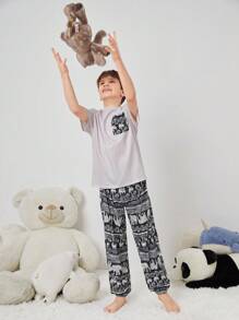 SHEIN Tween Boy Tween Girl Vintage Pattern Print Short Sleeve Top And Long Pants Knit Comfortable Casual Sleepwear Set With Pockets And Flame Retardant Features