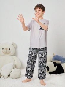 SHEIN Tween Boy Tween Girl Vintage Pattern Print Short Sleeve Top And Long Pants Knit Comfortable Casual Sleepwear Set With Pockets And Flame Retardant Features
