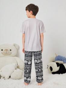 SHEIN Tween Boy Tween Girl Vintage Pattern Print Short Sleeve Top And Long Pants Knit Comfortable Casual Sleepwear Set With Pockets And Flame Retardant Features