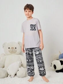 SHEIN Tween Boy Tween Girl Vintage Pattern Print Short Sleeve Top And Long Pants Knit Comfortable Casual Sleepwear Set With Pockets And Flame Retardant Features