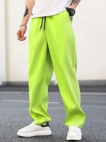 Manfinity EMRG Pantalones casuales rectos de pierna recta para hombres con cintura ajustable con cordón en color verde fluorescente para uso diario